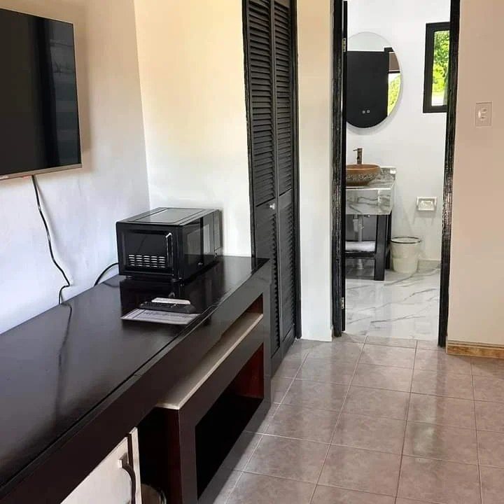 Desk and wardrobe in a guest room